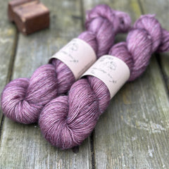Two skeins of purple yarn 