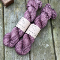 Two skeins of purple yarn