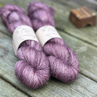 Two skeins of purple yarn