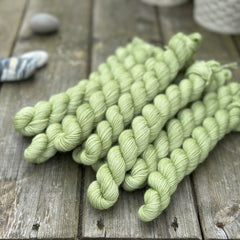 Green mini skeins of yarn