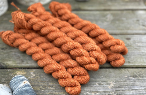 Orangey brown mini skeins of yarn