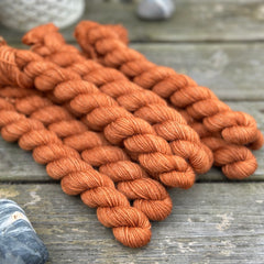 Orangey brown mini skeins of yarn