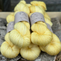Five skeins of yellow yarn