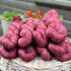 Purpley red skeins of yarn