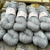 Nine skeins of grey yarn