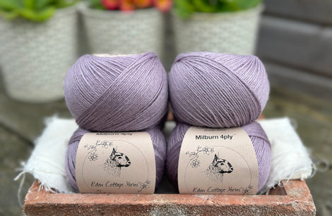 Balls of pale purple yarn