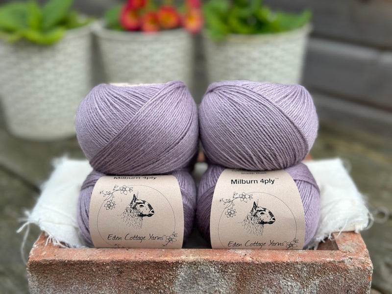 Balls of pale purple yarn
