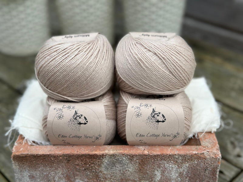 Balls of beige yarn