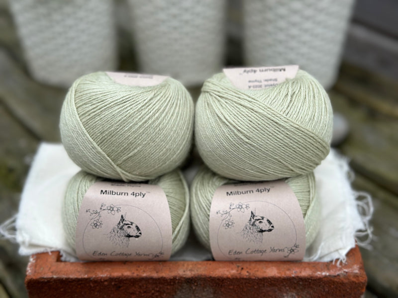 Balls of pale green yarn