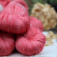 Close up image of rich pink yarn