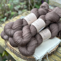 Five skeins of brown yarn