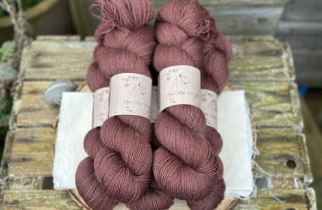 Five skeins of rich brown yarn