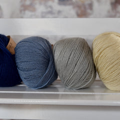 Four balls of Milburn in shades of blue and cream