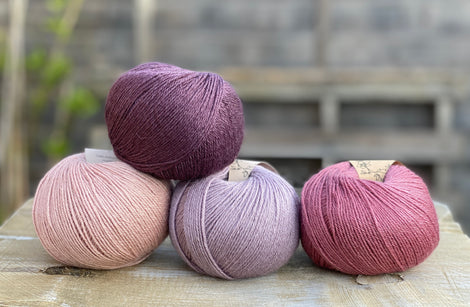 Four balls of Milburn in shades of pink and purple