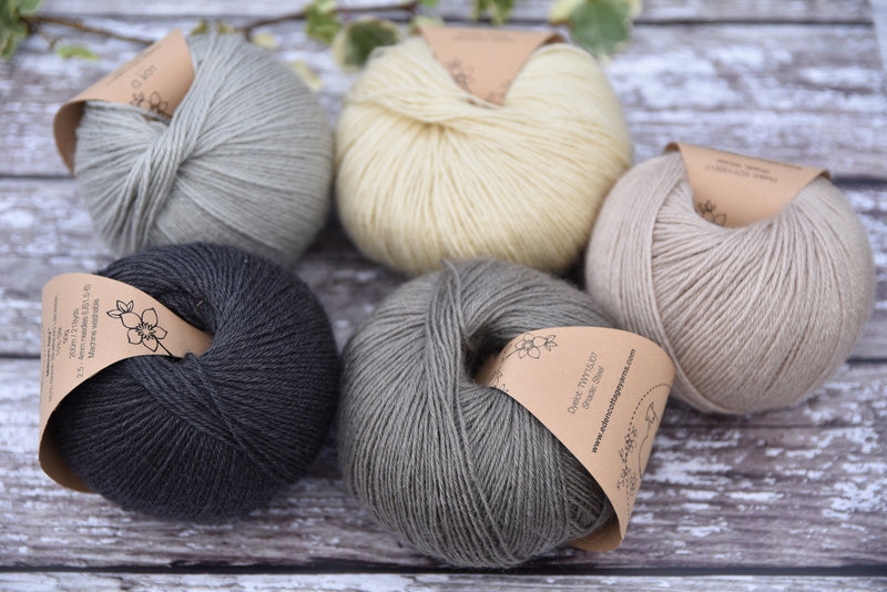 Five balls of Milburn in shades of grey, cream and beige