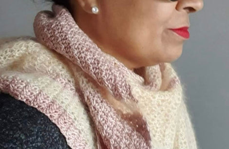 Helda wearing a pink and peach shawl