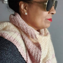 Helda wearing a pink and peach shawl 