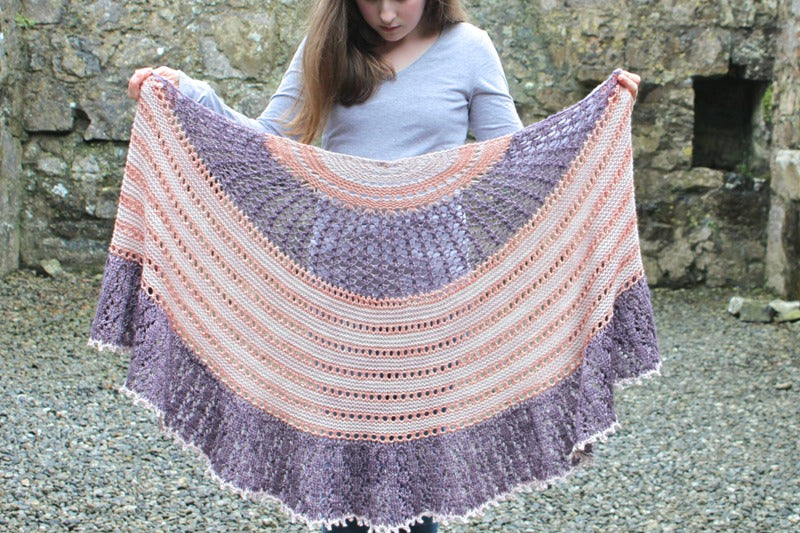 A cosy aran weight knitted shawl: Midnight Sunset