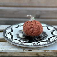 a knitted pumpkin made in Milburn DK in Rust