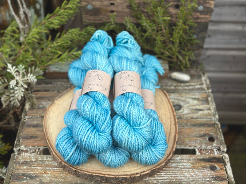 Five skeins of bright blue yarn