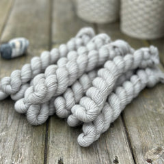 Grey mini skeins of yarn