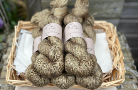 Five skeins of greeny brown yarn