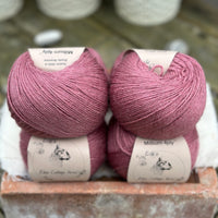 Balls of purple yarn