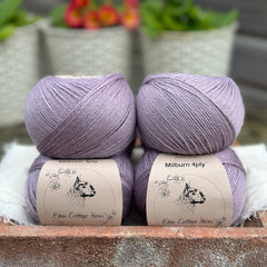 Balls of pale purple yarn