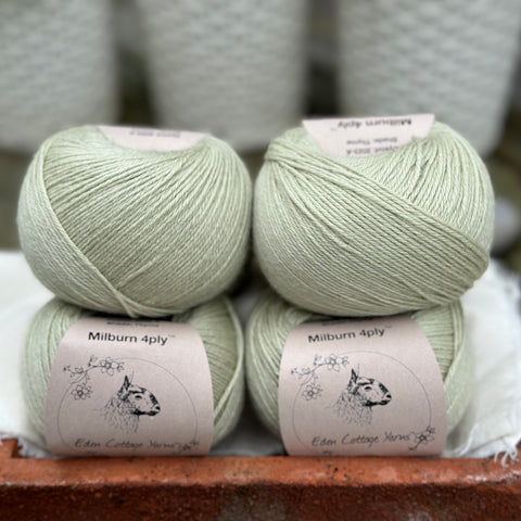 Balls of pale green yarn