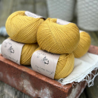 Balls of yellow yarn