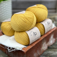 Balls of yellow yarn