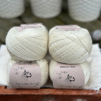 Balls of natural cream coloured yarn