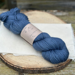 One skein of dark blue yarn
