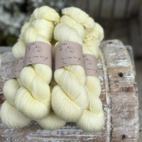 Five skeins of light zingy yellow yarn