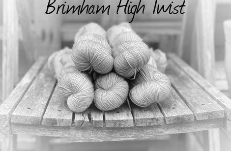 Black and white image of skeins of yarn with "Brimham High Twist" overlaid in black text