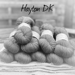 Black and white image of skeins of yarn with "Hayton DK" overlaid in black text