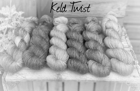 A black and white image of six skeins of yarn in different shades. "Keld Twist" is written at the top of the image.