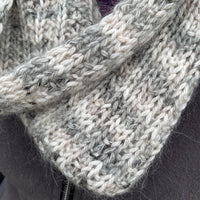 Close up detail of a cream and grey Swainby Cowl