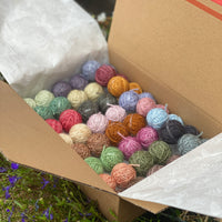 A box of 24 Yarnling pairs.