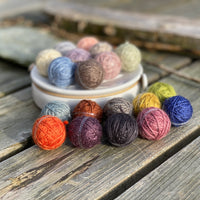 19 small balls of yarn